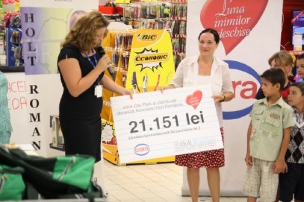 Cora a donat 20.000 de lei în contul Asociaţiei Holt